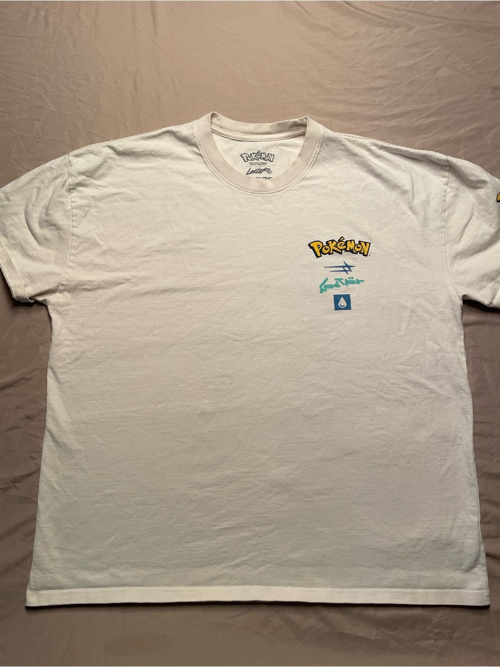 Pokemon Cream Short Sleeve Tee with Squirtle Graphic Print on Back - Men’s Large